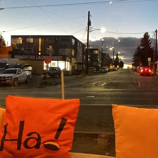 a view of a street from inside a bus