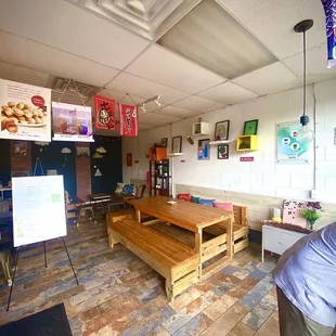  a man standing in the middle of the room