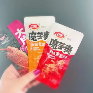 Trying konjac snacks (vegetarian) and they are spicy.