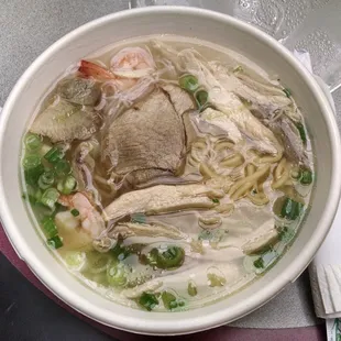 Combo egg noodles with chicken, shrimp, and pork