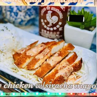 a plate of chicken and noodles