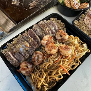 Fried rice and spicy noodles with New York steak and shrimp