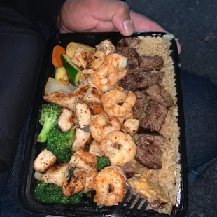 Shrimp, chicken, filet mignon , fried rice, and veggies