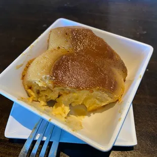 a plate of pancakes and a fork