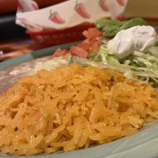 Side plate for my Habanero Chicken...rice, beans, sour cream, avocado, tomatoes, and lettuce