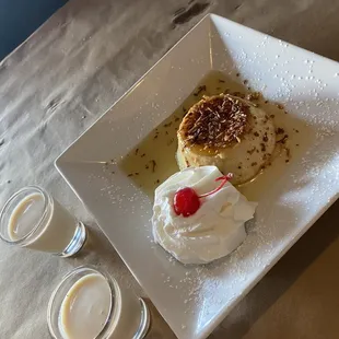 Coconut flan and complimentary shots