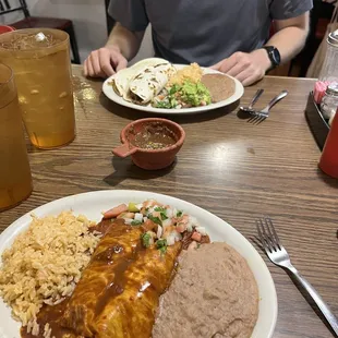 Chicken enchiladas and 2 carne asada tacos