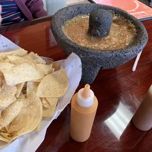 Salsa and chips and hot sauce