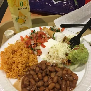 Three rolled tacos combo w/ Spanish rice &amp; whole beans !