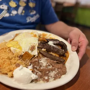 Chilliquilles rojo, with carne asada, super yummy!