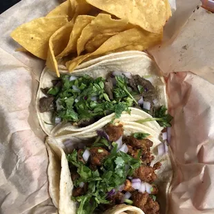 Carne asada and al pastor tacos ($3.50/each)