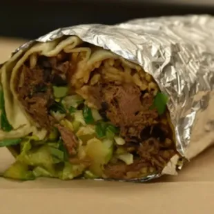 Delicious  burrito that you can find with us.