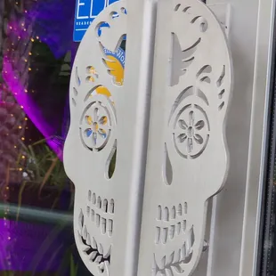 a close up of a sugar skull