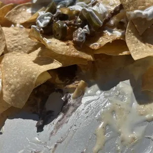 Crappy nachos w no meat or many toppings