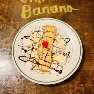 a waffle with ice cream and chocolate sauce