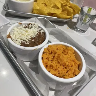 Side of refried beans and Mexican rice