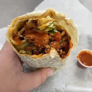 Adobada burrito w/ hot sauce