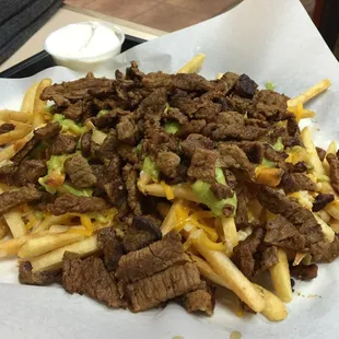 Carne Asada Fries. Comes with sour cream too.