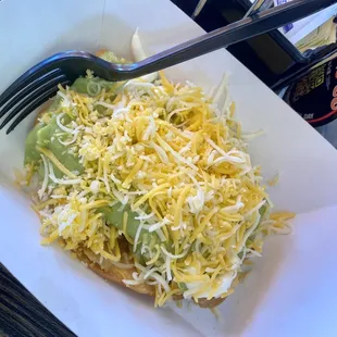 3 taquitos with cheese, sour cream and guacamole