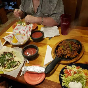 a woman eating a meal
