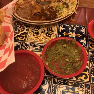a variety of mexican food on a table