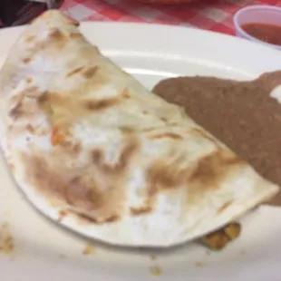 Chorizo and egg taco with beans.