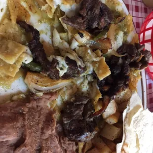 Chiliquilles with Beef Fajita meat!!