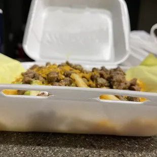  a taco in a styrofoam container