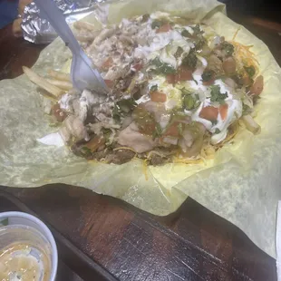 After piling up toppings they missed on carne asada fries.