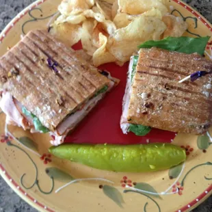 The Rutherford...cracked mill turkey with melted pepper jack cheese, sun dried tomato mayo, lettuce and tomato on herb focaccia