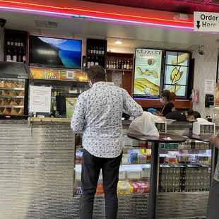 a man standing at a counter