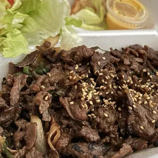 Bulgogi lunch special with gyoza and citrus salad