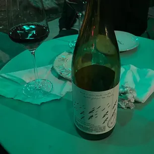 a bottle of wine on a table