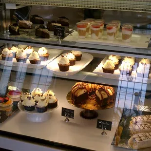 a display of cakes and pastries