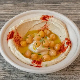 a bowl of hummusl