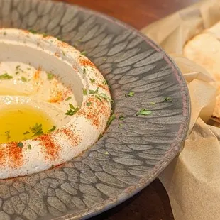 Hummus with pita bread.