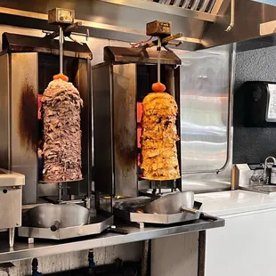 two kebabs being cooked