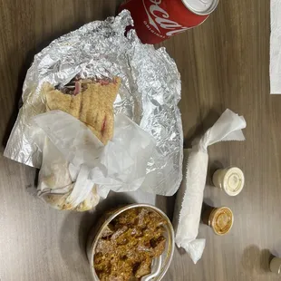 Mixed Shawarma Pita Combo with spicy potatoes. Sorry for mid bite pic.