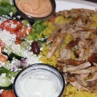 a salad with chicken and rice