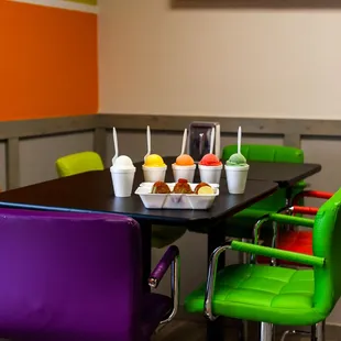 a colorful table and chairs