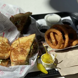 The Santa Barbara burger with a side of onions rings