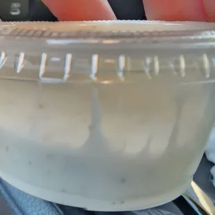 It was thrown into the bag and was on its side. It didn't spill. This should still be free. Not worth the extra .60 cents.