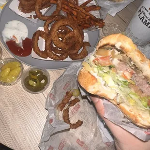 Teriyaki burger, onion rings, and sweet potato fries