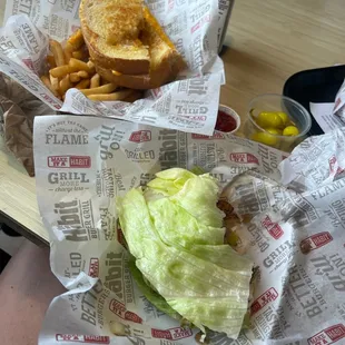 Grilled cheese and lettuce wrap teriyaki burger