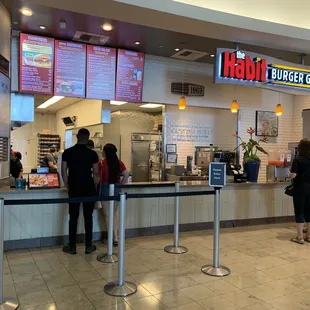 people standing at the counter