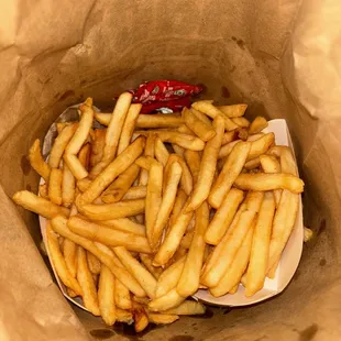 french fries in a paper bag