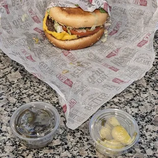 Charburger with cheese plus jalapenos and chili peppers