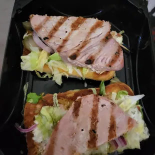 Ahi tuna sandwich $9.39. Pic is w/out the top piece of bread so u can see the portion of fish.  Tasty but I like fish in all my bites.