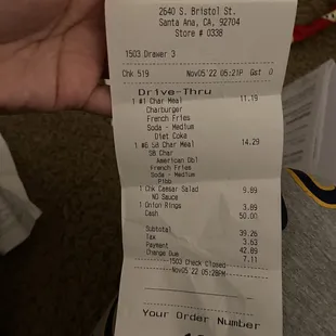 a person holding a receipt
