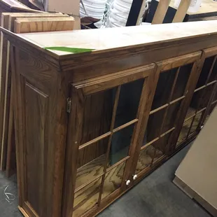 Top kitchen cabinets with glass panels.